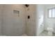 Clean shower with gray tile and built-in niche at 1675 N Monterey Dr, Apache Junction, AZ 85120