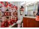 Bathroom with shower/tub combo, wood vanity, and granite top at 17561 N Saddle Ridge Dr, Surprise, AZ 85374