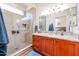 Bathroom with granite vanity, large shower and tile flooring at 17561 N Saddle Ridge Dr, Surprise, AZ 85374