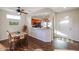 Dining area with wood table and chairs, kitchen view at 17561 N Saddle Ridge Dr, Surprise, AZ 85374