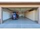 Two-car garage with built-in storage and epoxy flooring at 17561 N Saddle Ridge Dr, Surprise, AZ 85374