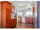 Spacious kitchen with ample cabinetry, granite countertops, and stainless steel appliances at 17561 N Saddle Ridge Dr, Surprise, AZ 85374