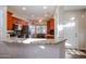 Kitchen features granite countertops and wood cabinets at 17561 N Saddle Ridge Dr, Surprise, AZ 85374