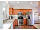 Well-equipped kitchen with granite countertops and stainless steel appliances at 17561 N Saddle Ridge Dr, Surprise, AZ 85374