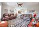 Open living area with two leather sofas and southwestern decor at 17561 N Saddle Ridge Dr, Surprise, AZ 85374