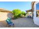 Spacious backyard with gravel and seating area at 17824 W Addie Ln, Surprise, AZ 85374