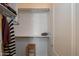Small closet with shelving and a small bench at 17824 W Addie Ln, Surprise, AZ 85374