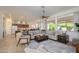 Bright living room with comfortable seating and large windows at 17824 W Addie Ln, Surprise, AZ 85374