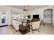 Comfortable living room with tile flooring and ample natural light at 17824 W Addie Ln, Surprise, AZ 85374