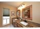 Elegant bathroom with granite countertops and double sinks at 18658 E Mazatzal Cir, Rio Verde, AZ 85263