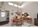 Bright dining room with wood table and chairs, kitchen view at 18658 E Mazatzal Cir, Rio Verde, AZ 85263