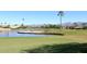 Golf course with water feature and mountain views at 18658 E Mazatzal Cir, Rio Verde, AZ 85263