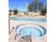 Relaxing hot tub with surrounding lounge chairs at 18658 E Mazatzal Cir, Rio Verde, AZ 85263