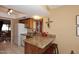 Kitchen with granite countertops and breakfast bar at 18658 E Mazatzal Cir, Rio Verde, AZ 85263