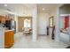 Bright entryway with views into the kitchen and living areas at 20516 N Vermillion Cliffs Dr, Surprise, AZ 85387