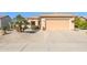 Beautiful desert landscaping and two-car garage at 20516 N Vermillion Cliffs Dr, Surprise, AZ 85387