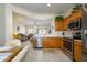 Open kitchen features stainless steel appliances and views to living room at 20516 N Vermillion Cliffs Dr, Surprise, AZ 85387