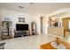 Open concept living room with views into the kitchen at 20516 N Vermillion Cliffs Dr, Surprise, AZ 85387