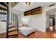 Small bedroom with spiral staircase, built-in shelves, and a daybed at 2206 N 12Th St, Phoenix, AZ 85006