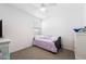 Bedroom with a daybed and dresser, featuring a window with blinds at 34210 N Beeblossom Trl, San Tan Valley, AZ 85144