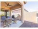 Covered patio, water feature and grill in a small backyard at 40 Almarte Cir, Carefree, AZ 85377