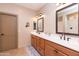 Bathroom with double vanity, modern fixtures, and a large mirror at 40 Almarte Cir, Carefree, AZ 85377
