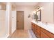 Elegant bathroom with double vanity, modern fixtures, and a large mirror at 40 Almarte Cir, Carefree, AZ 85377
