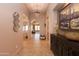 Bright and spacious entryway with tile floors and decor at 40 Almarte Cir, Carefree, AZ 85377