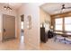 Elegant entryway with tile flooring and access to an office at 40 Almarte Cir, Carefree, AZ 85377