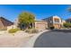 Two story home with tan siding and attached garage at 40 Almarte Cir, Carefree, AZ 85377