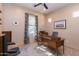 Bright home office features a large desk and built-in shelving at 40 Almarte Cir, Carefree, AZ 85377