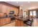 Eat-in kitchen with island seating and modern finishes at 40 Almarte Cir, Carefree, AZ 85377