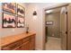 Laundry room with wooden cabinets and Maytag appliances at 40 Almarte Cir, Carefree, AZ 85377