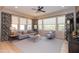Spacious living area with light gray sofa and wood flooring at 40 Almarte Cir, Carefree, AZ 85377