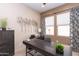 Spacious home office with ample natural light and stylish decor at 40 Almarte Cir, Carefree, AZ 85377