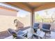 Covered patio with seating area and small water fountain at 40 Almarte Cir, Carefree, AZ 85377