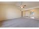 Bright living room with vaulted ceiling and ceiling fan at 4842 W Cinnabar Ave, Glendale, AZ 85302