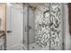 Clean bathroom with updated shower and stylish tile at 500 W Clarendon Ave # F5, Phoenix, AZ 85013