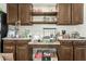 Additional kitchen counter space with wood cabinets and storage at 5308 N 2Nd Ave, Phoenix, AZ 85013