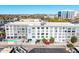 Aerial view of a modern apartment building with a pool at 535 W Thomas Rd # 508, Phoenix, AZ 85013