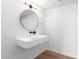 Modern bathroom with floating vanity and large mirror at 535 W Thomas Rd # 508, Phoenix, AZ 85013