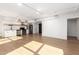Open concept living area with hardwood floors and modern kitchen at 535 W Thomas Rd # 508, Phoenix, AZ 85013