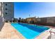 Refreshing community pool with patio furniture at 535 W Thomas Rd # 508, Phoenix, AZ 85013