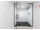Modern shower with glass enclosure and black accents at 535 W Thomas Rd # 508, Phoenix, AZ 85013