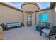 Private courtyard with seating area, perfect for relaxing at 5841 W Bushwood Ct, Florence, AZ 85132