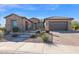 Beautiful desert landscape home with attractive stonework and garage at 5841 W Bushwood Ct, Florence, AZ 85132