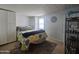 Cozy bedroom with a full-size bed and ample closet space at 650 N Hawes Rd # 5107, Mesa, AZ 85207