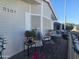 Charming patio with small table and potted plants at 650 N Hawes Rd # 5107, Mesa, AZ 85207