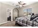 Comfortable bedroom with queen bed and private bathroom access at 6825 E Pearl St, Mesa, AZ 85207