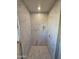 Modern shower with marble tile walls and floor, recessed shelf at 7316 W Cavalier Dr, Glendale, AZ 85303